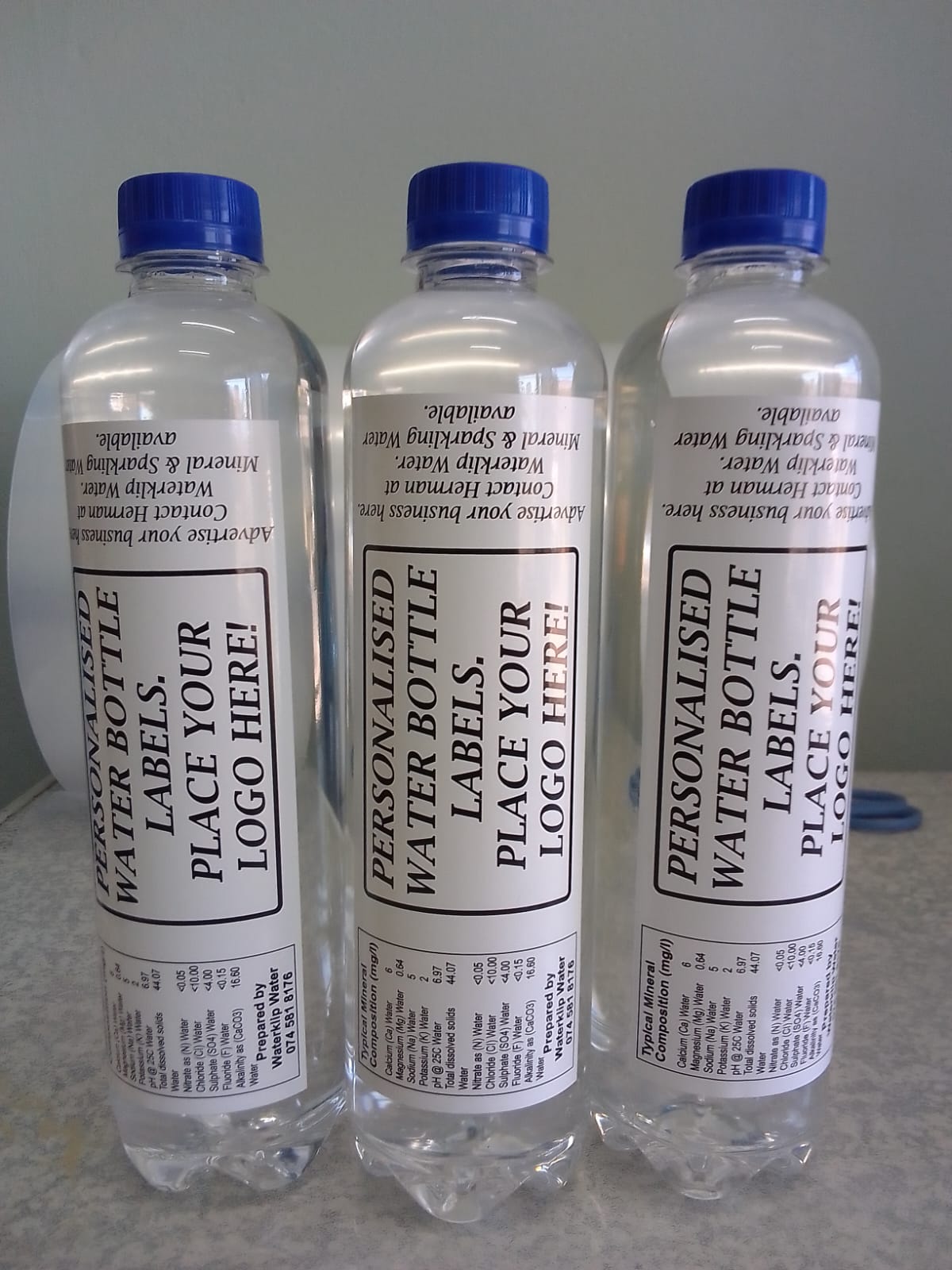 Drie Waterklip bottels met persoonlike etikette
